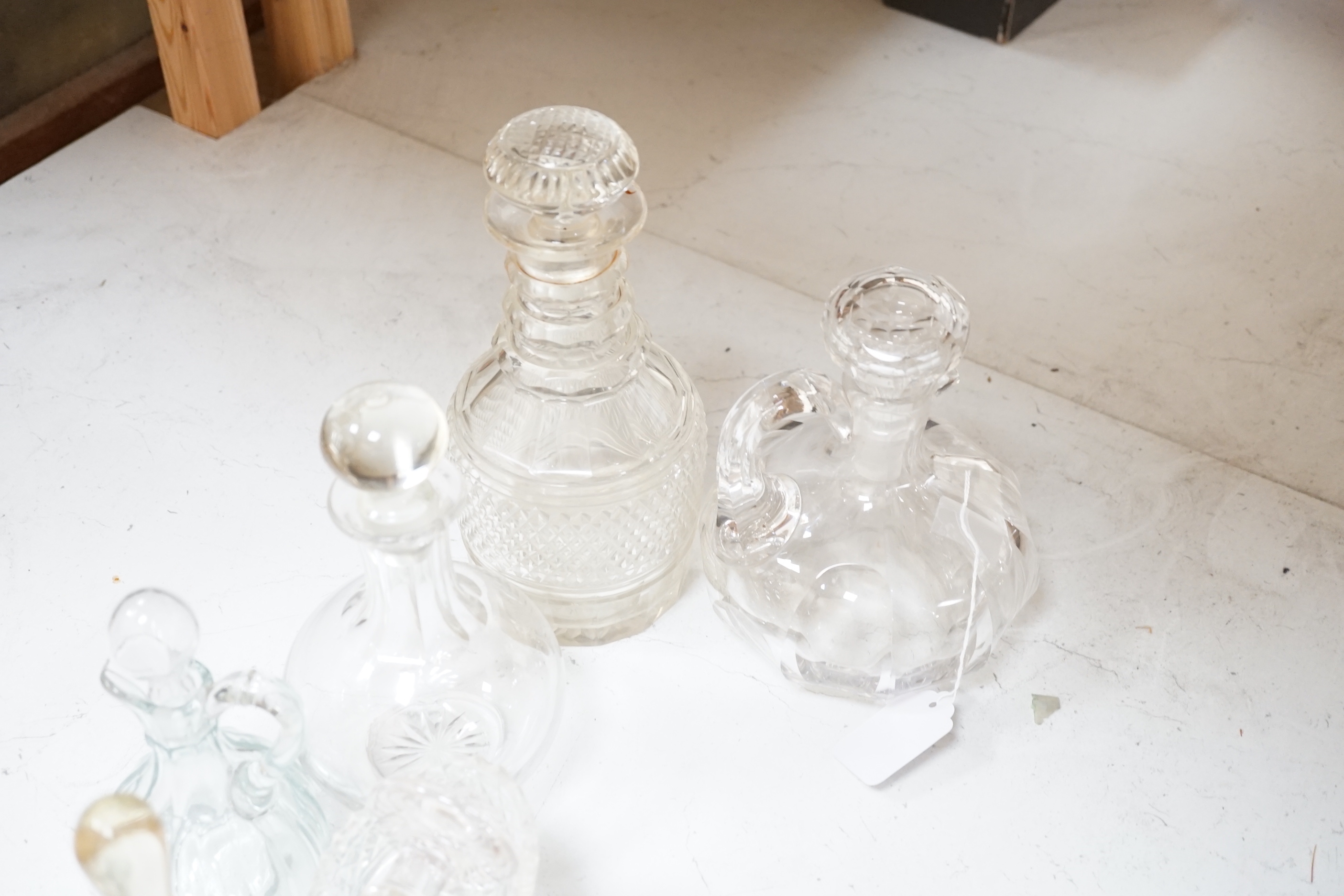 Seven cut glass decanters and stoppers and other cut glass, tallest decanter 26cm high including stopper